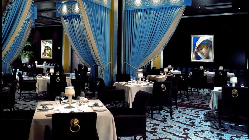 elegant restaurant with blue drapes