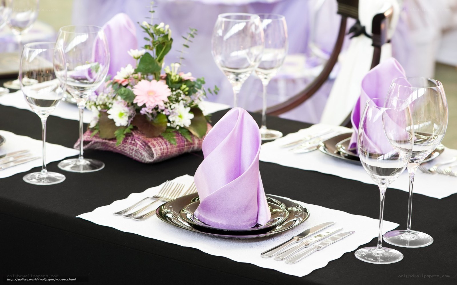 Elegant table setting with purple accents