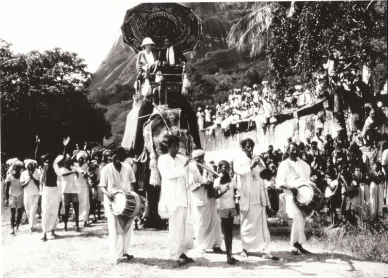 Elephant procession with musicians