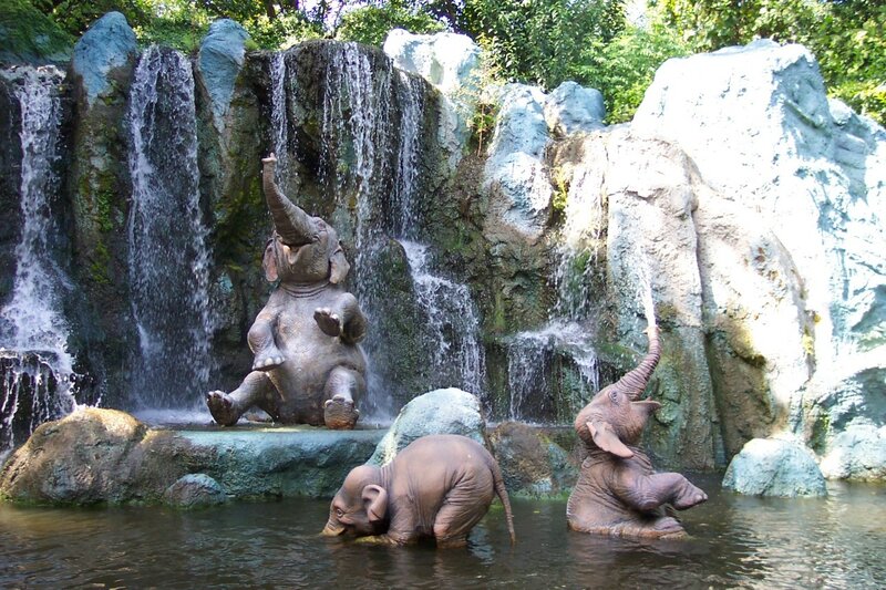 elephant statues by waterfall