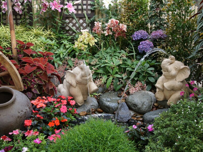 Elephant Statues in Garden — Green