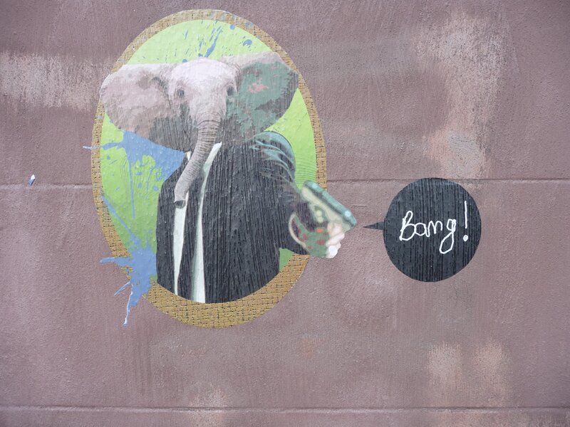elephant with gun mural