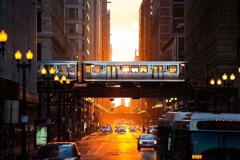 Elevated Train in City — Orange