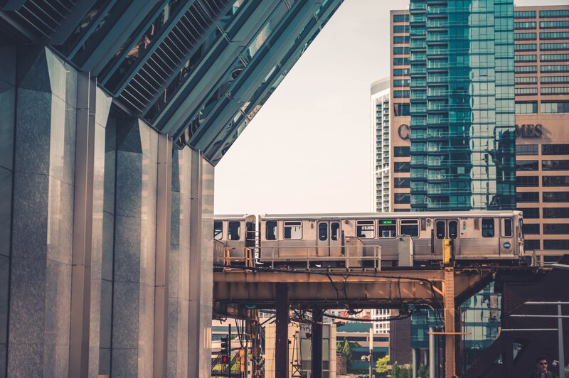 Elevated train in urban landscape
