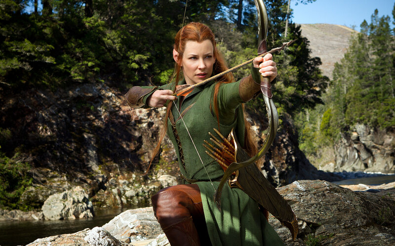 Elf Archer Aiming Bow — Green, Focused, Afternoon, Photograph