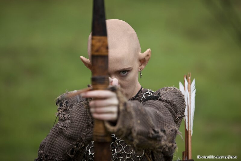 Elf Archer Aiming Bow — Green, Focused, Photograph, Arrow