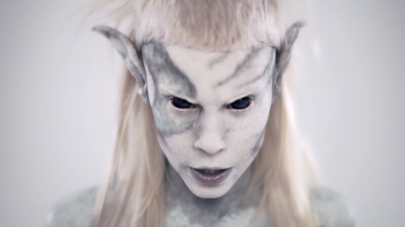 elf character with pale makeup