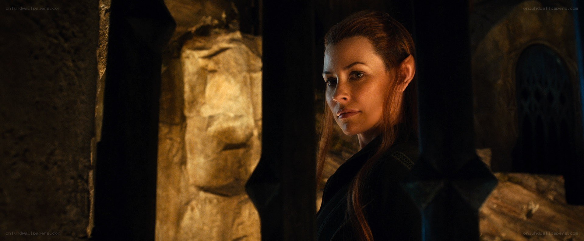 elf woman in stone corridor