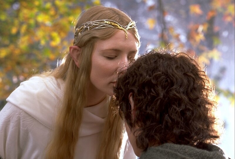 elf woman kissing hobbit