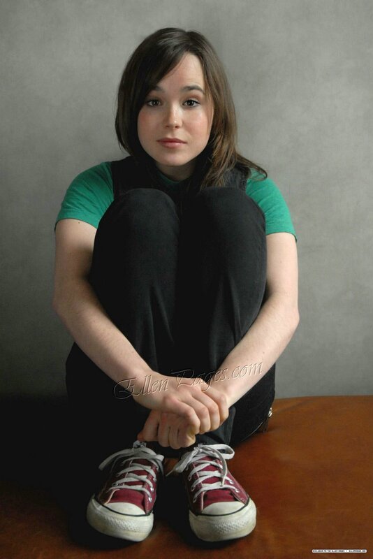 Ellen Page sitting on a table