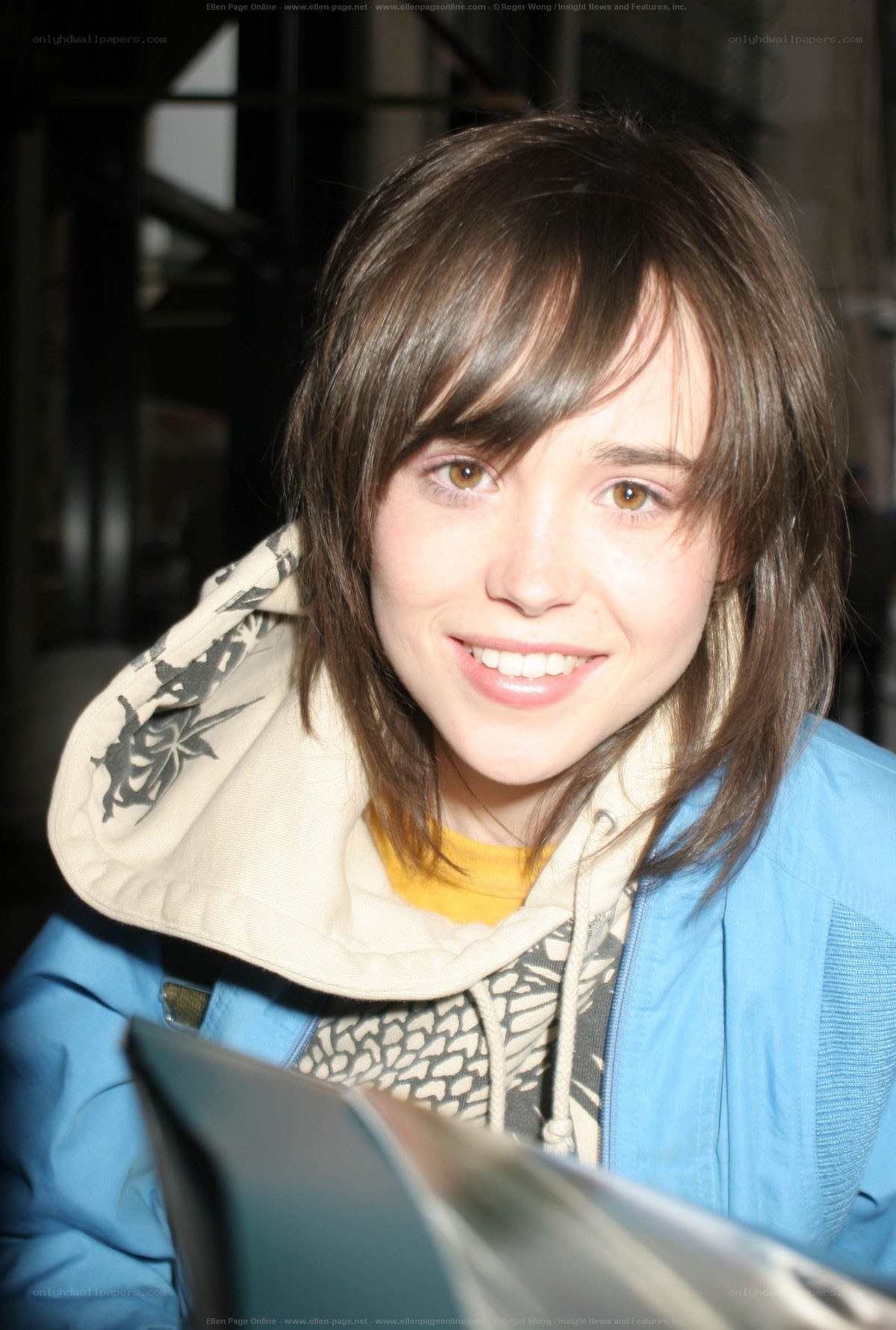 Ellen Page smiling at event