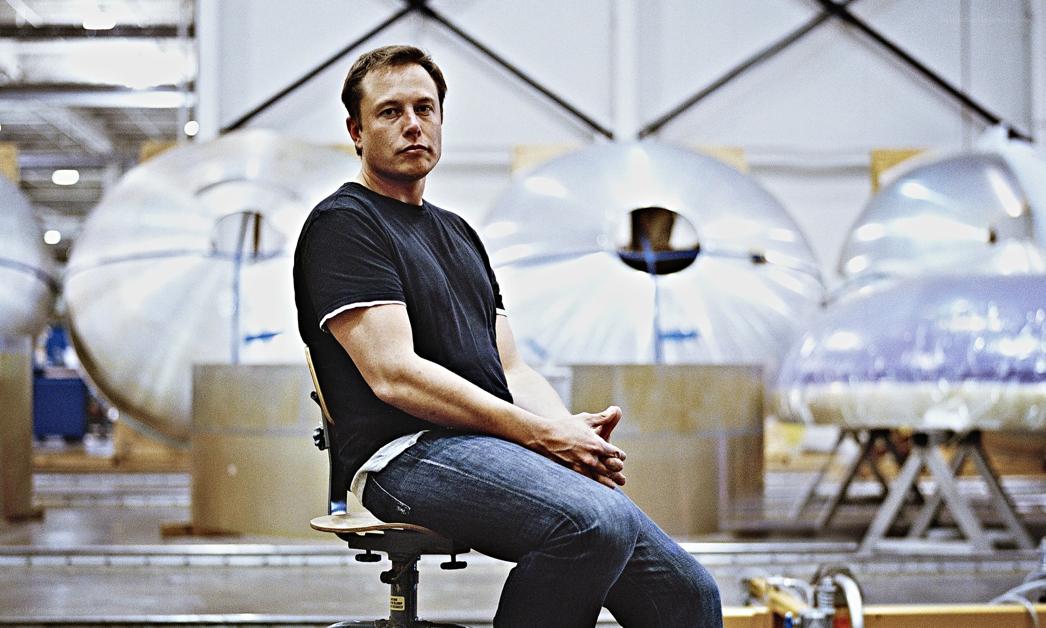Elon Musk in a factory