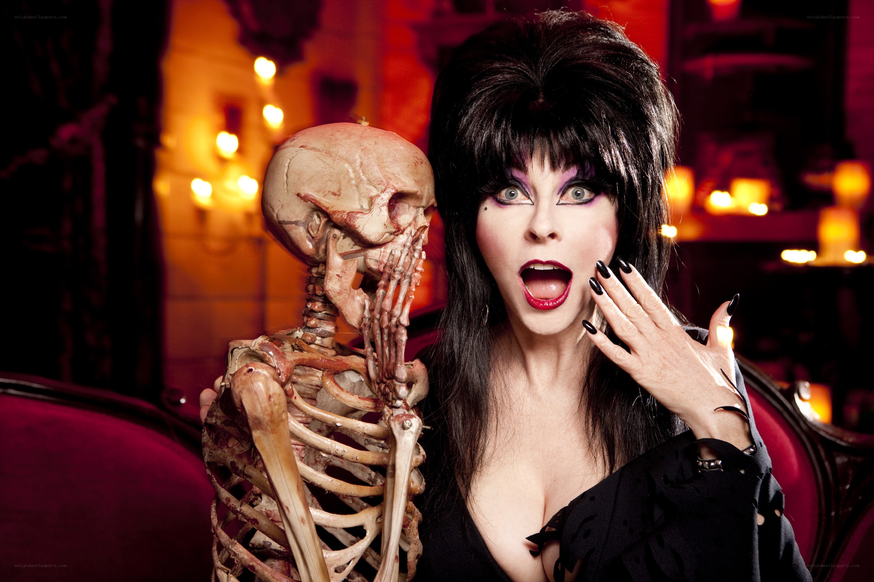Elvira with skeleton prop