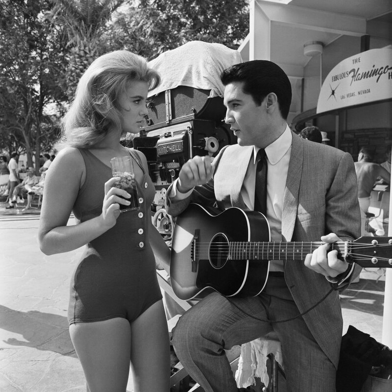 Elvis and a woman on set