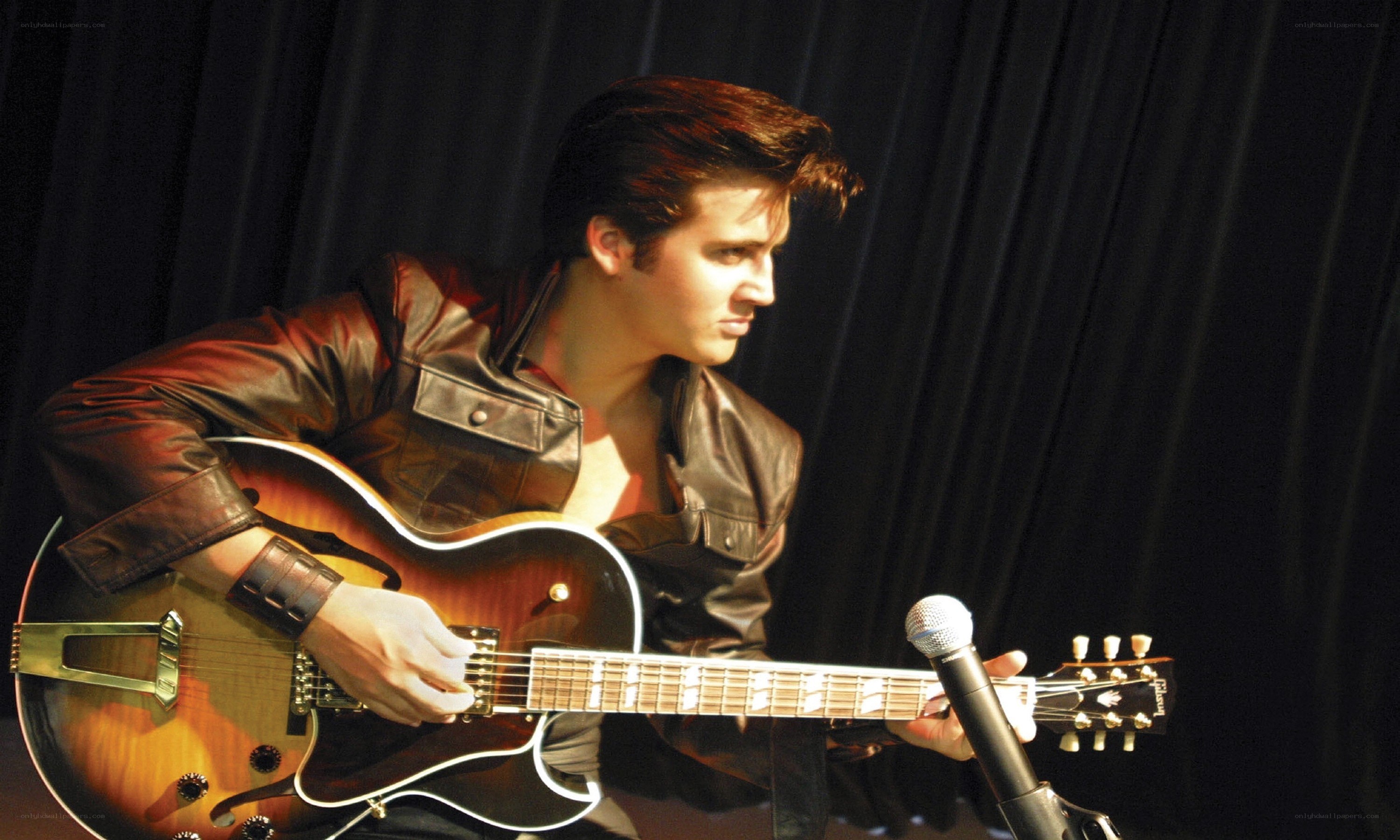 Elvis impersonator on stage