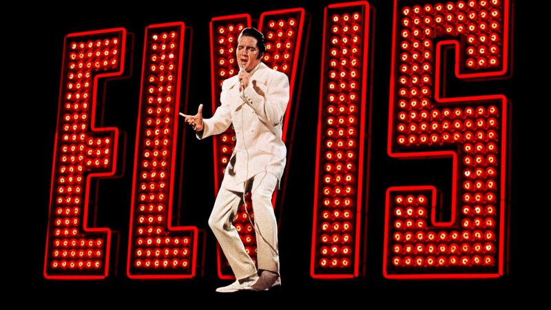 Elvis performing on stage