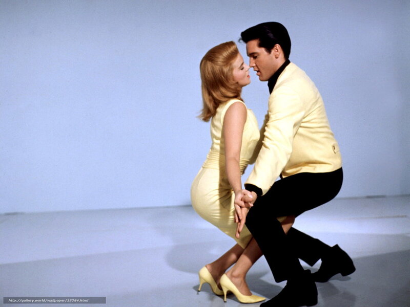 Elvis Presley and a woman dancing