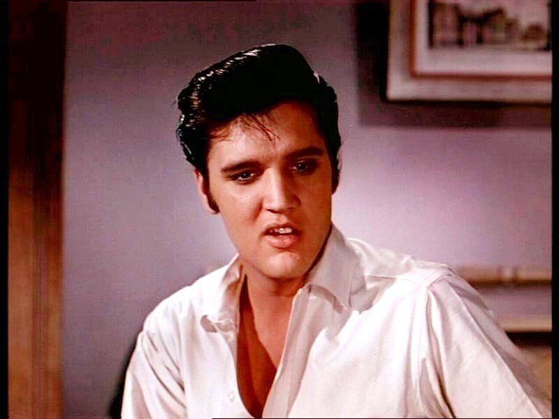 Elvis Presley in white shirt