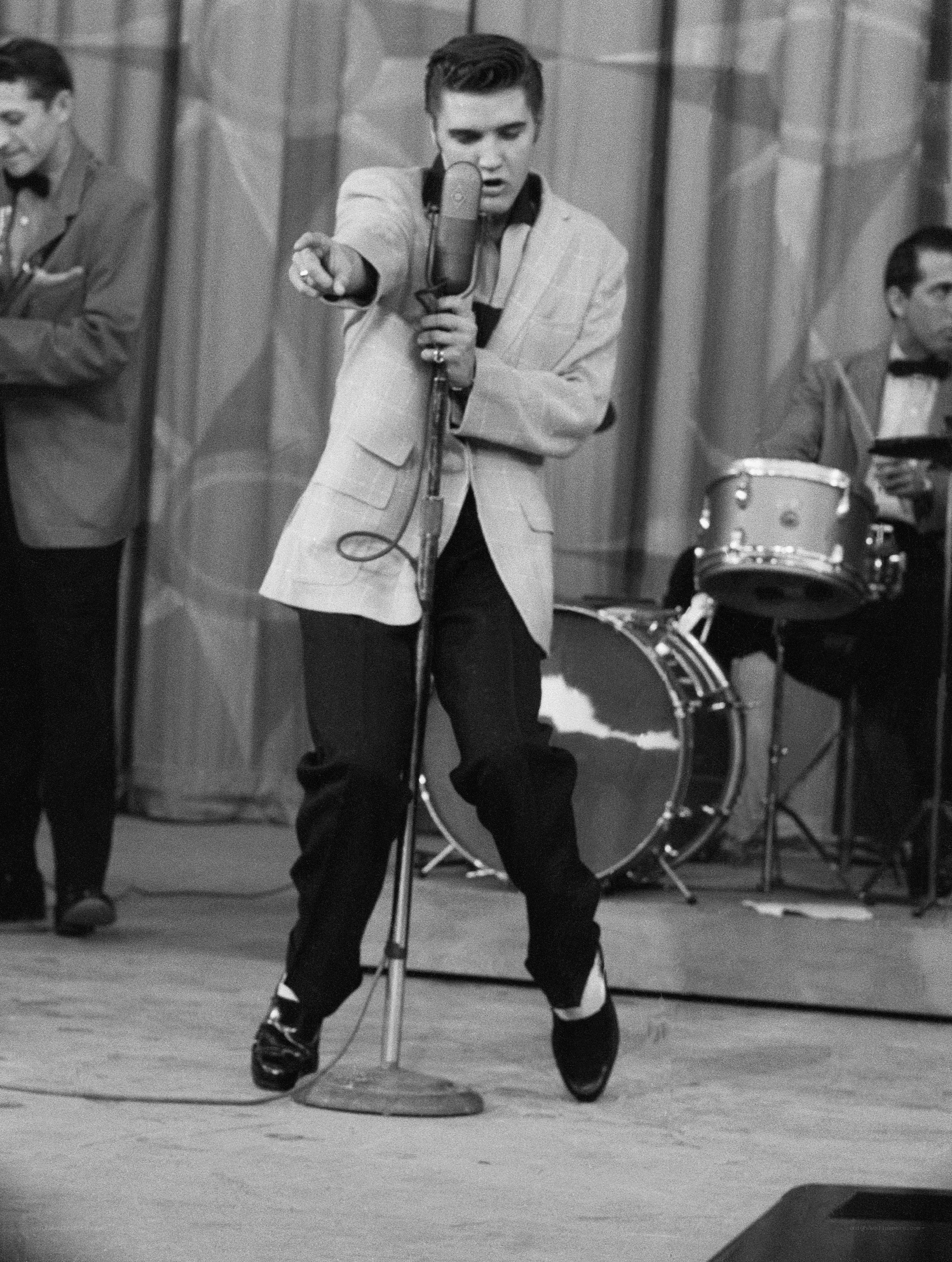 Elvis Presley performing on stage