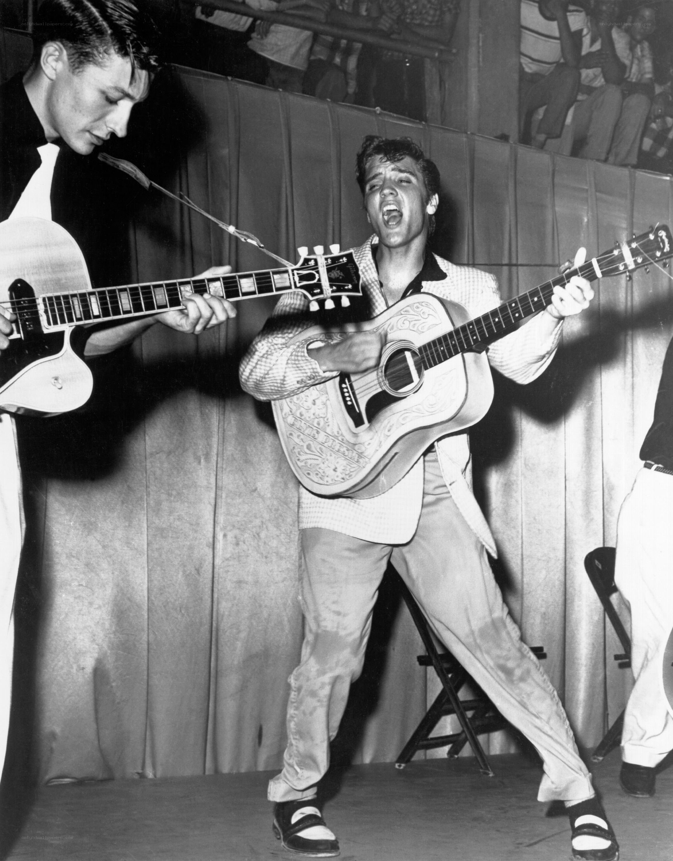 Elvis Presley performing on stage