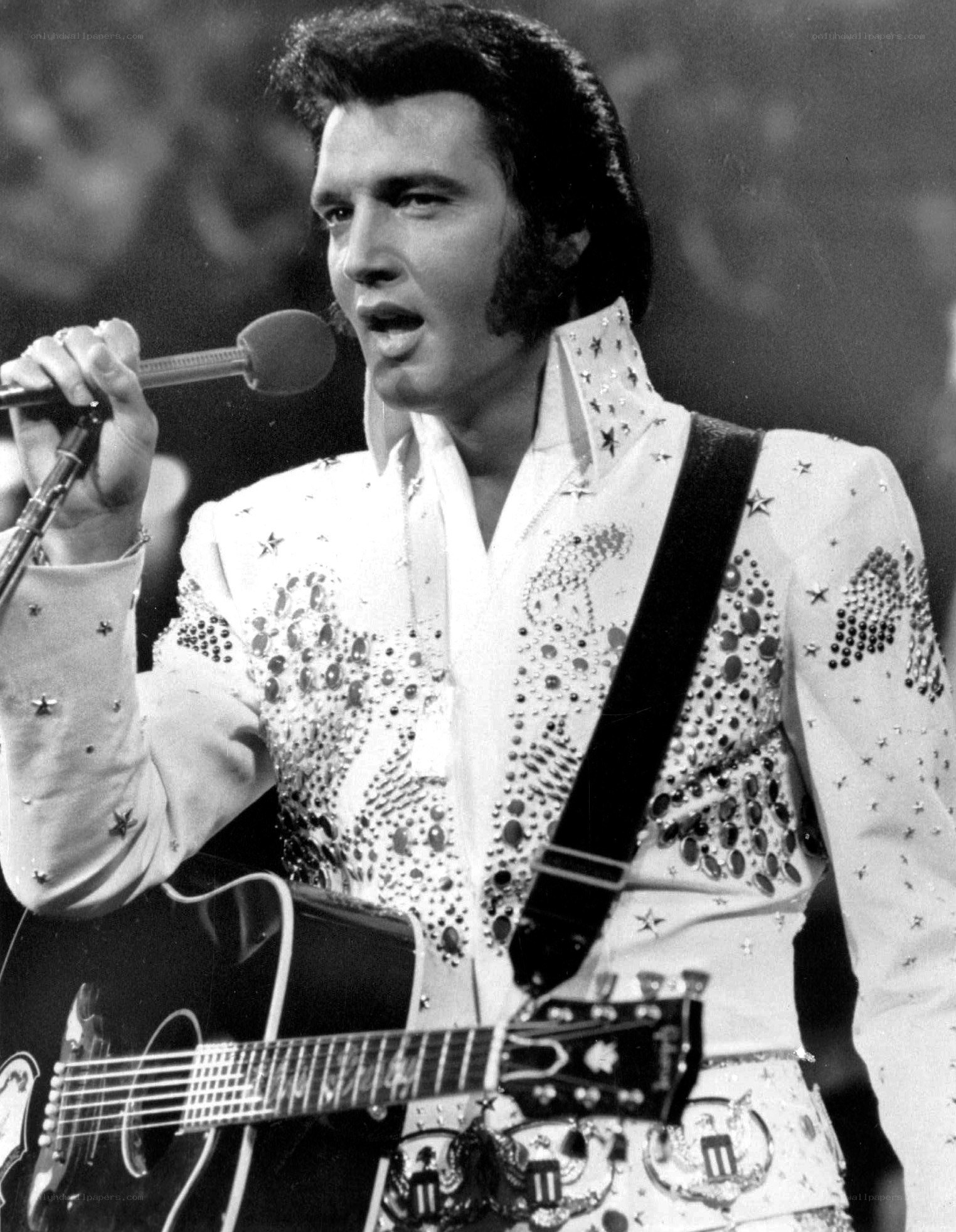 Elvis Presley performing on stage