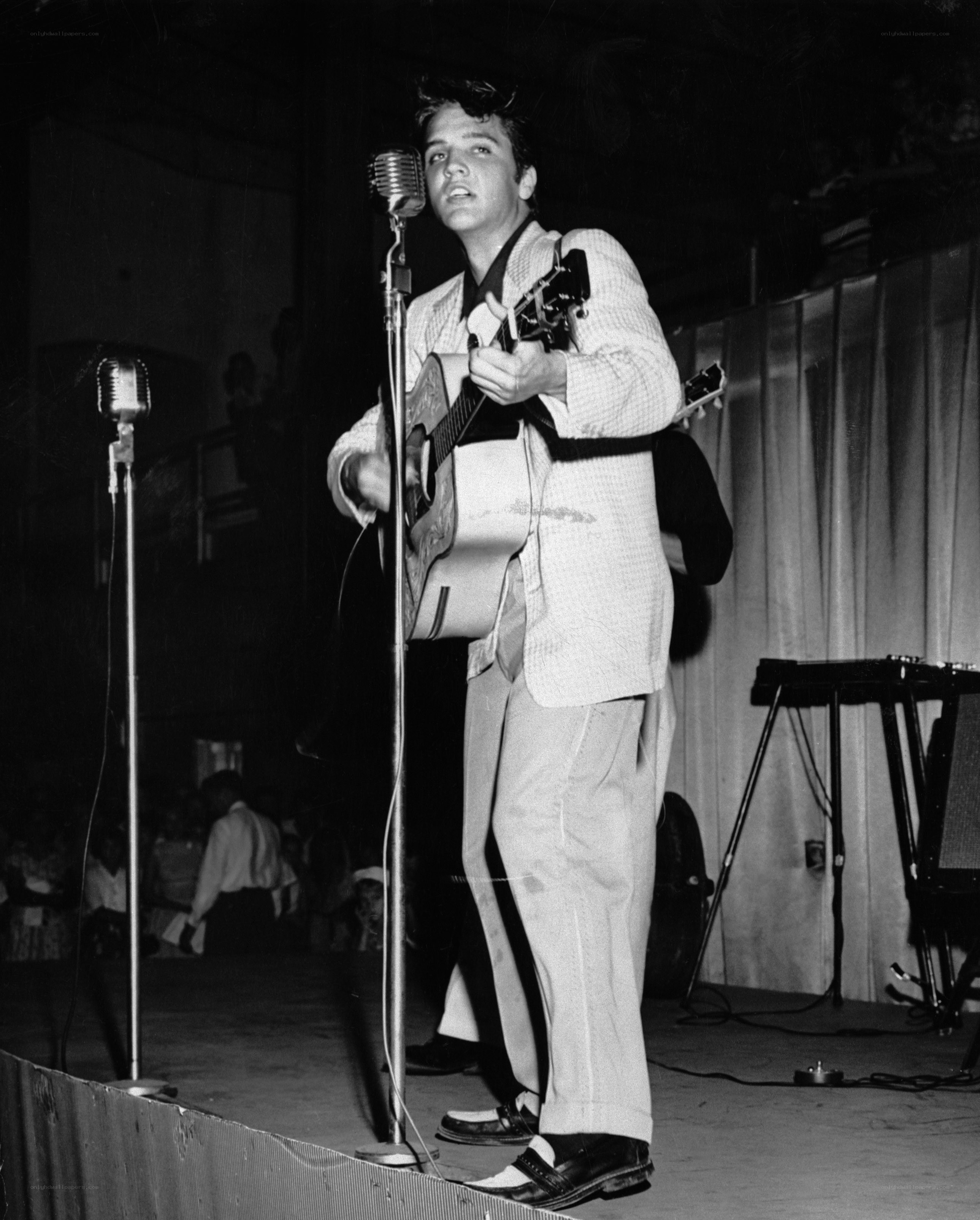 Elvis Presley performing on stage