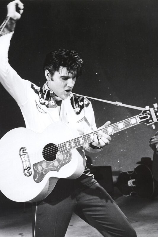 Elvis Presley performing on stage