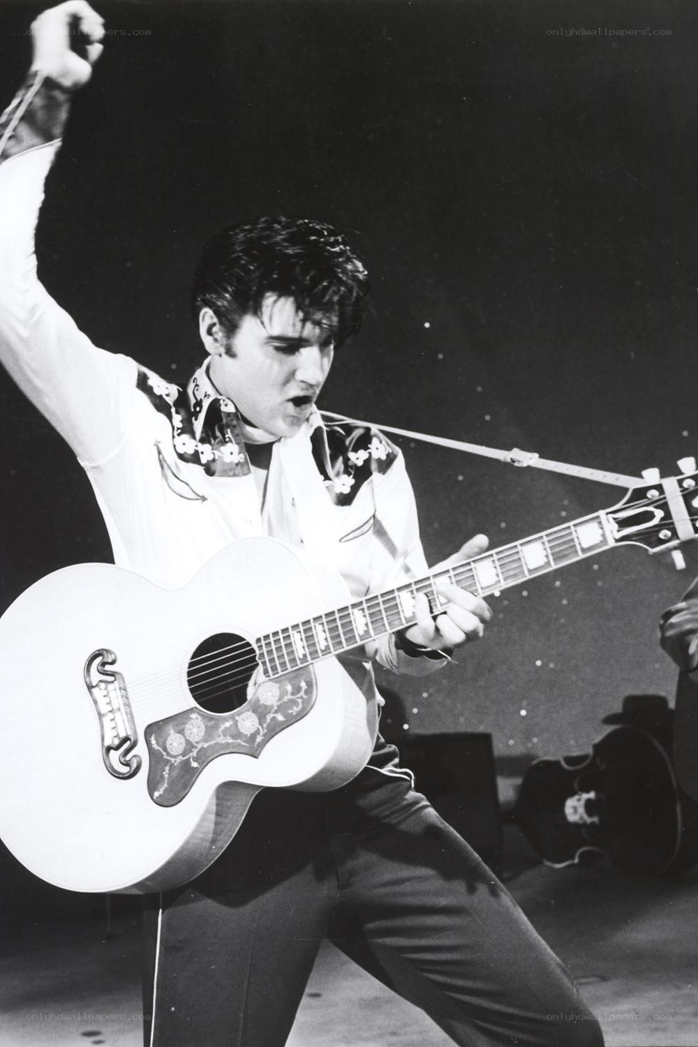 Elvis Presley performing on stage
