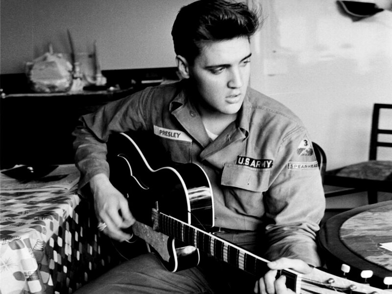 Elvis Presley Playing Guitar — Black, Contemplative
