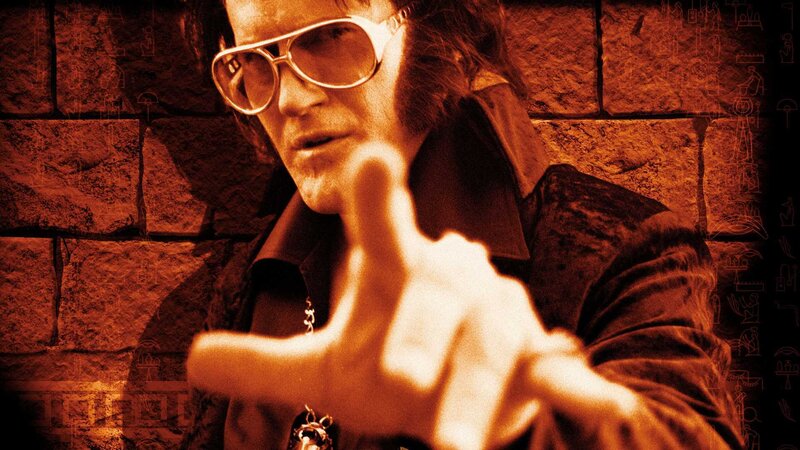 Elvis Presley pointing at camera