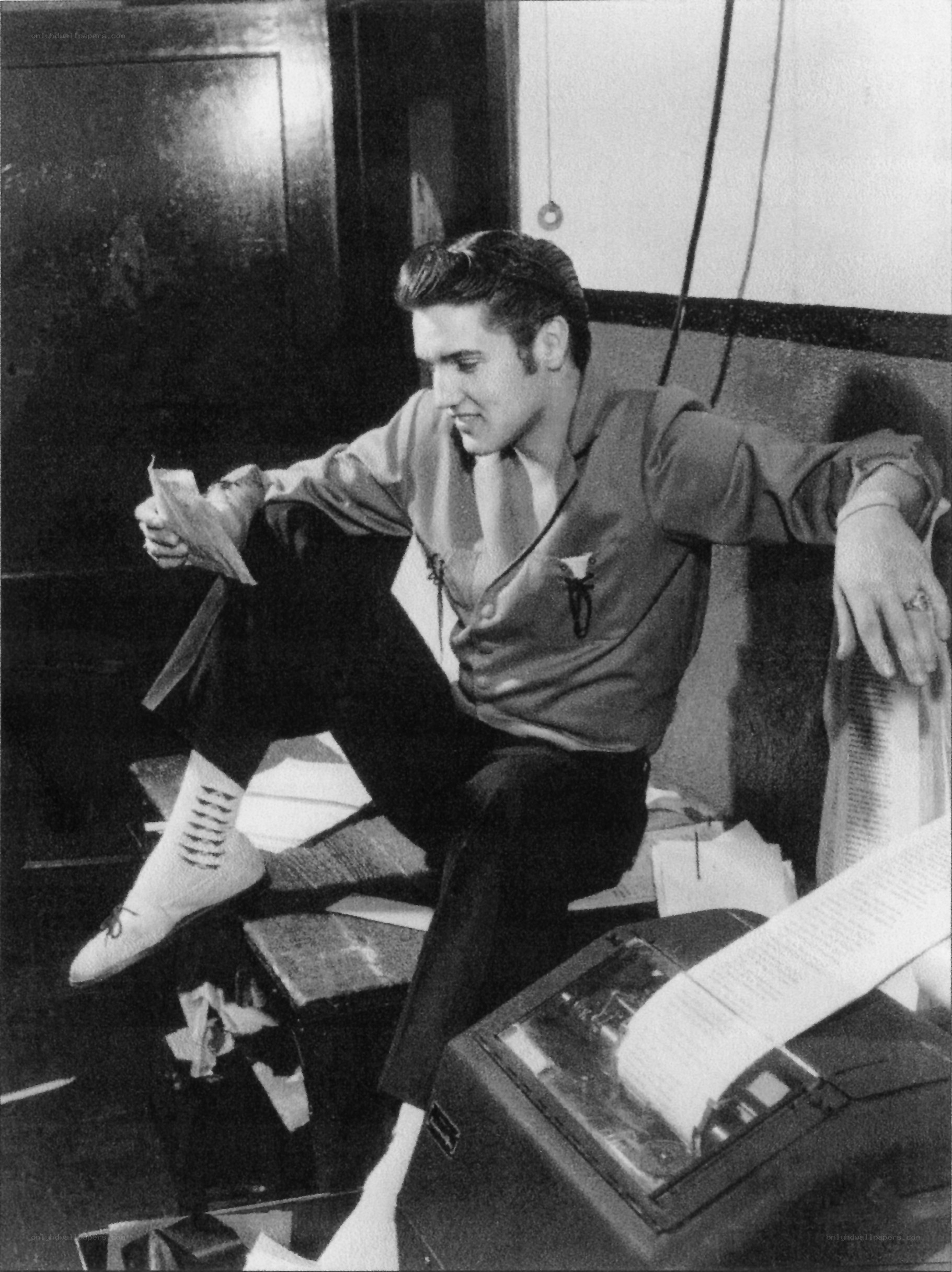 Elvis Presley reading in studio