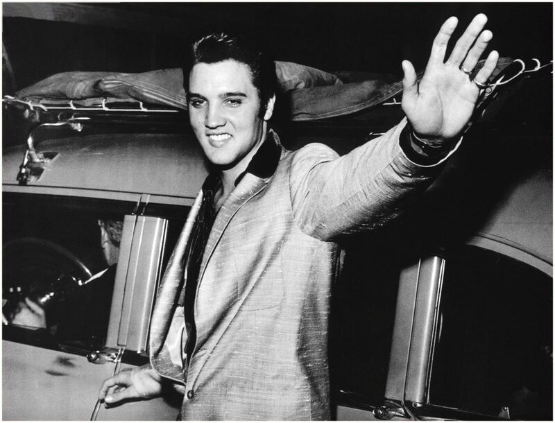 Elvis Presley waving