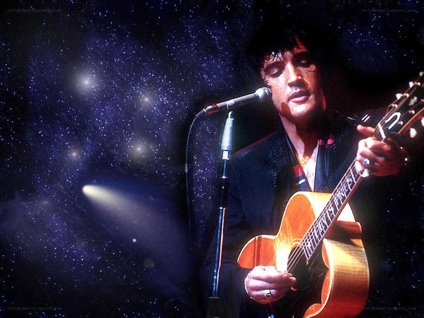 Elvis singing with guitar