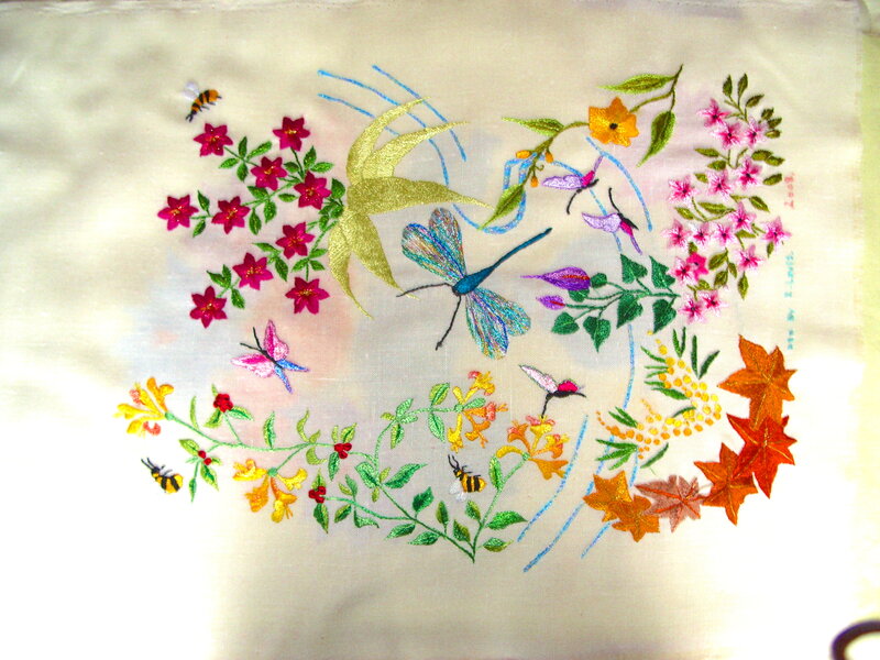 Embroidered garden scene