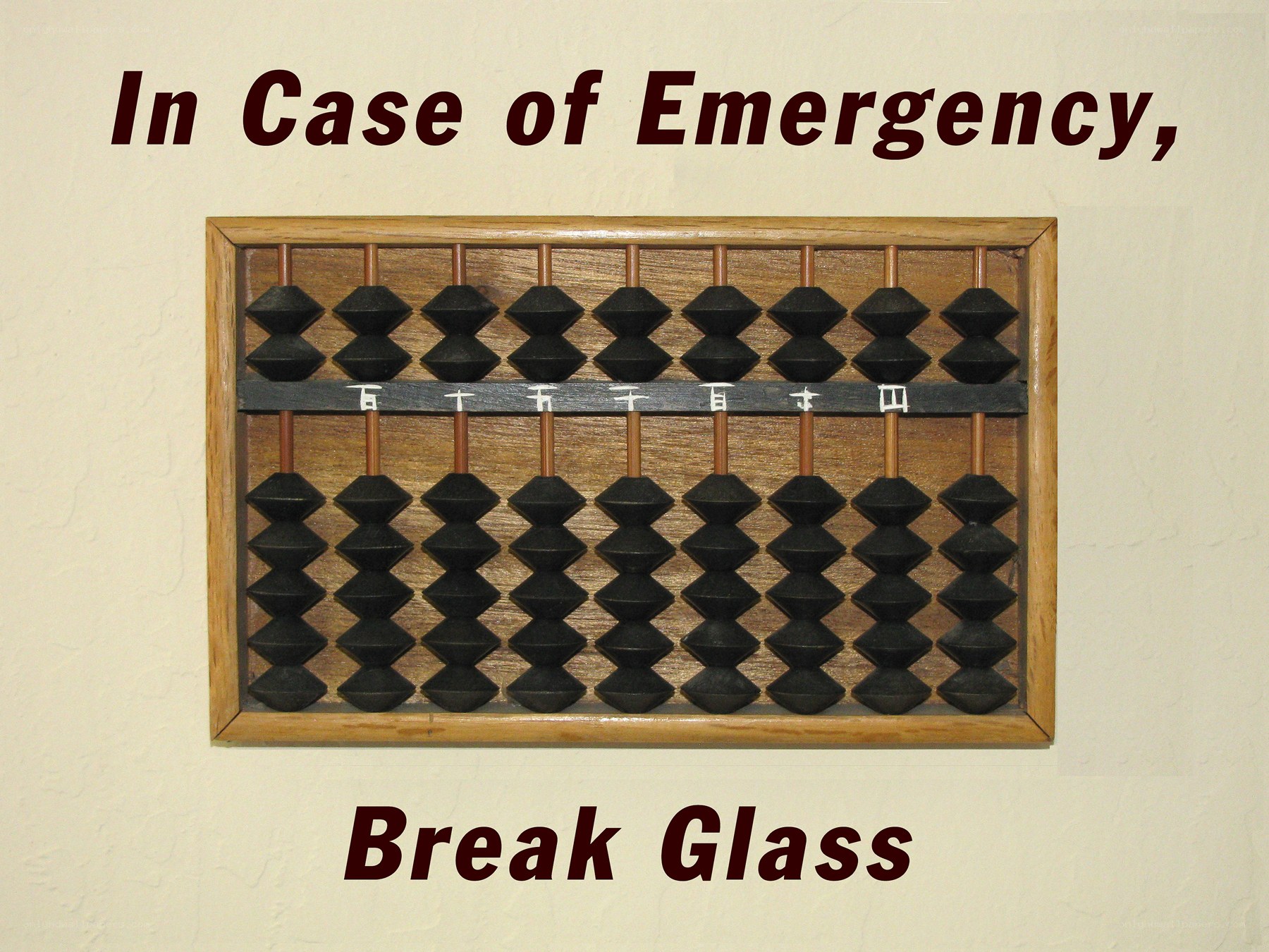 emergency break glass sign