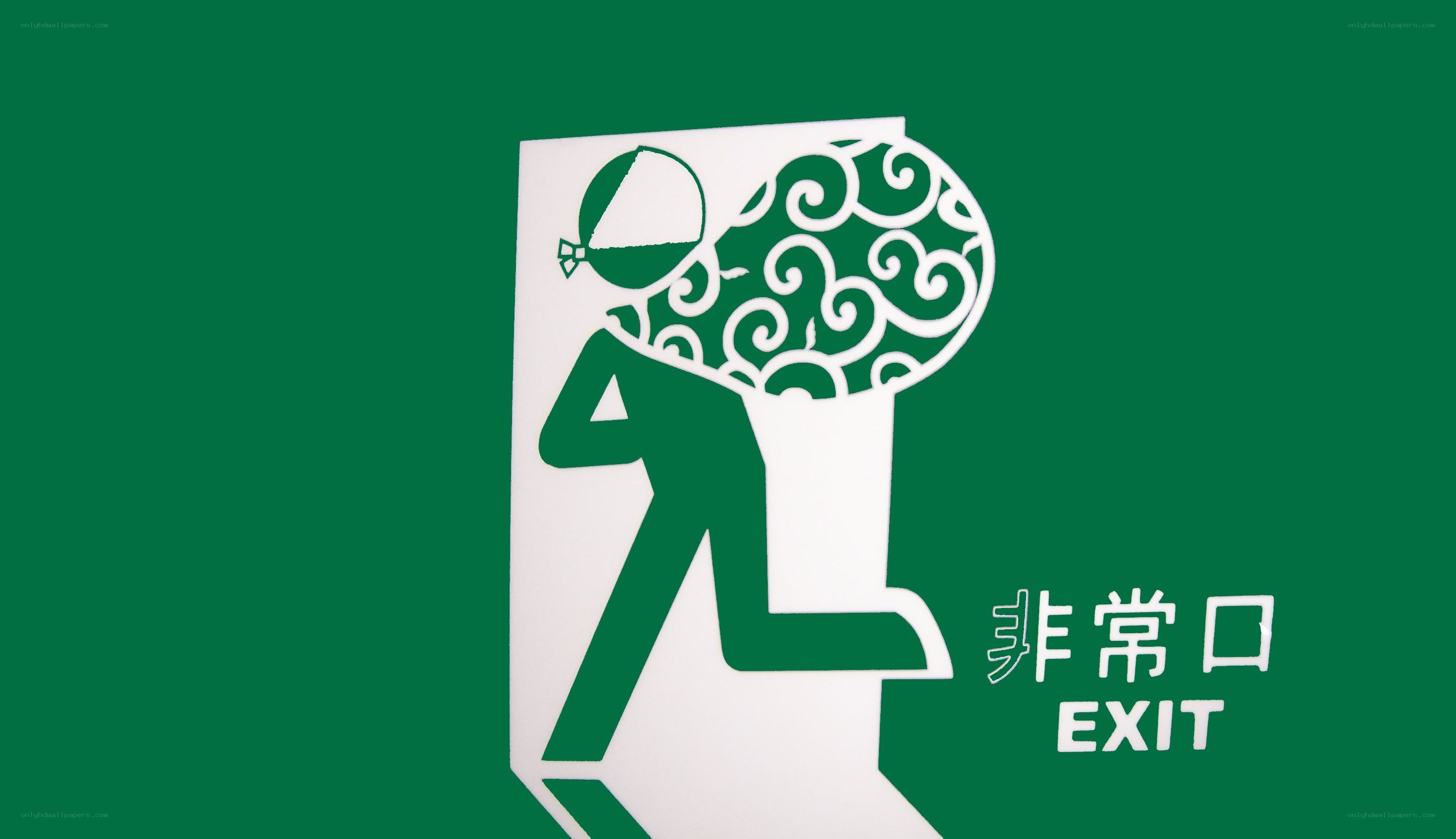 emergency exit sign with cartoon figure
