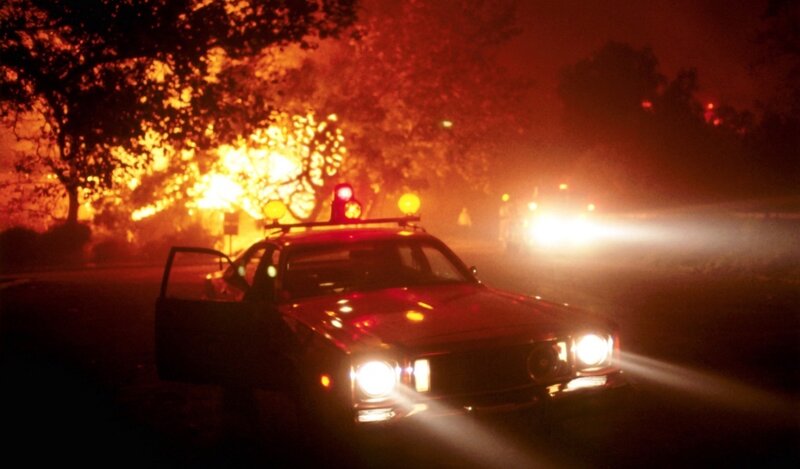Emergency vehicle at wildfire scene