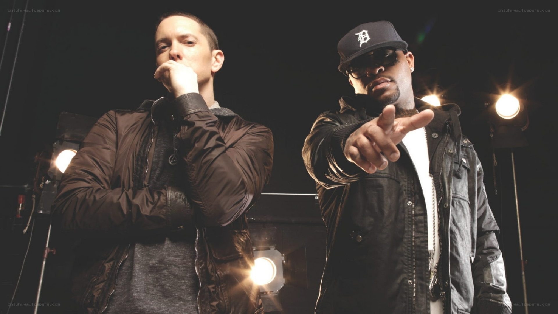 Eminem and a rapper on stage