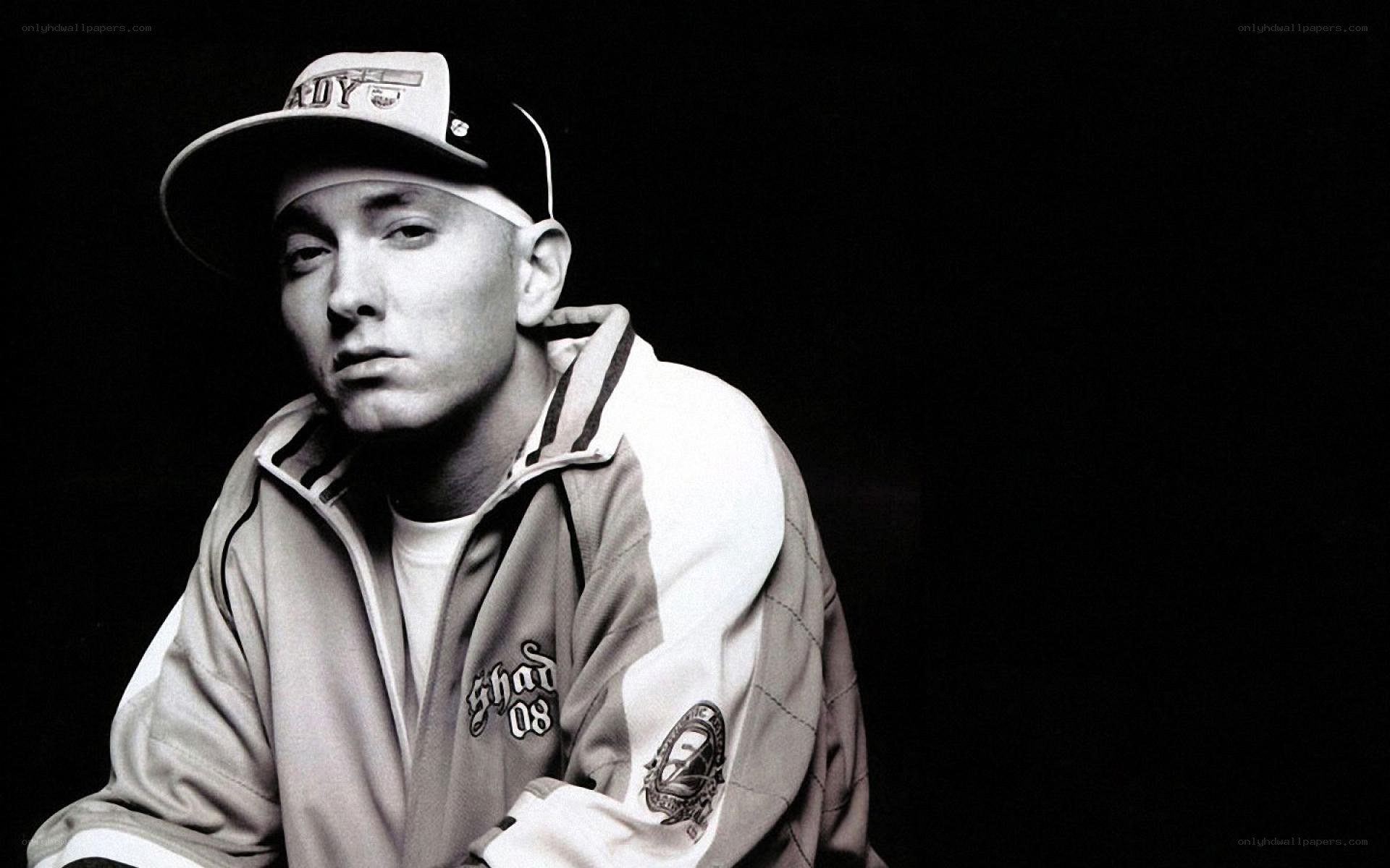 Eminem in a cap and jacket