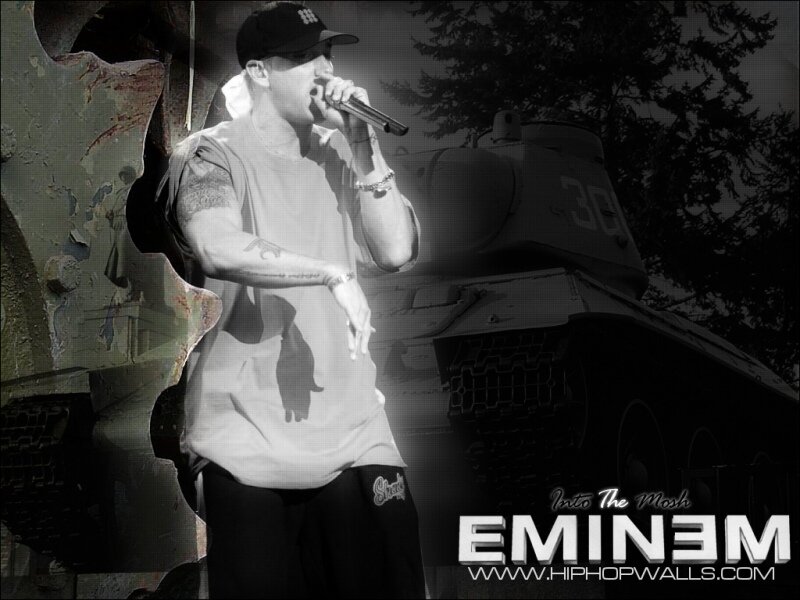 Eminem performing with tank