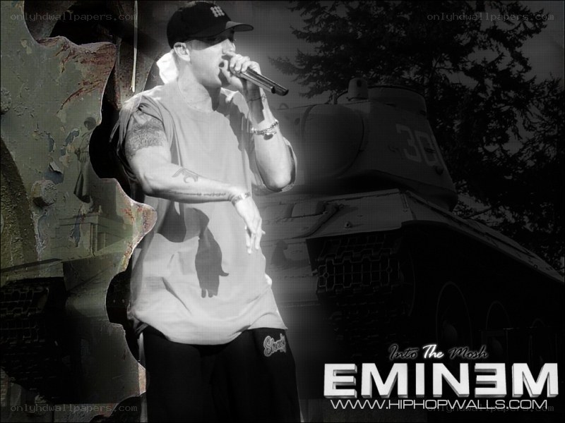Eminem performing with tank