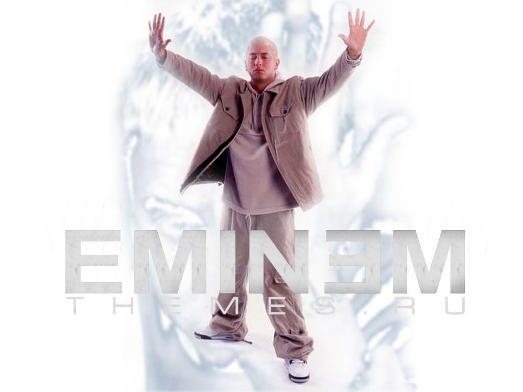 Eminem with arms raised