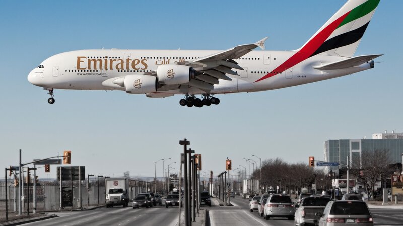 Emirates A380 Airplane — White, Dramatic, Afternoon