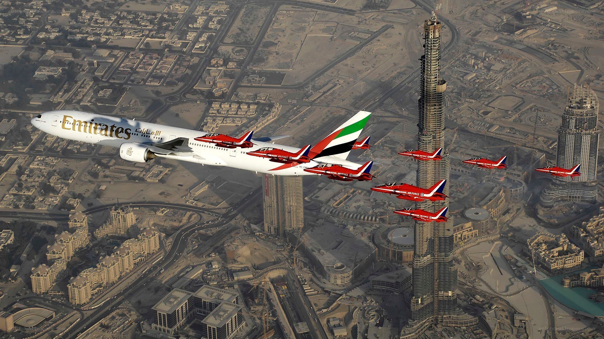 Emirates Boeing 777 with Red Arrows