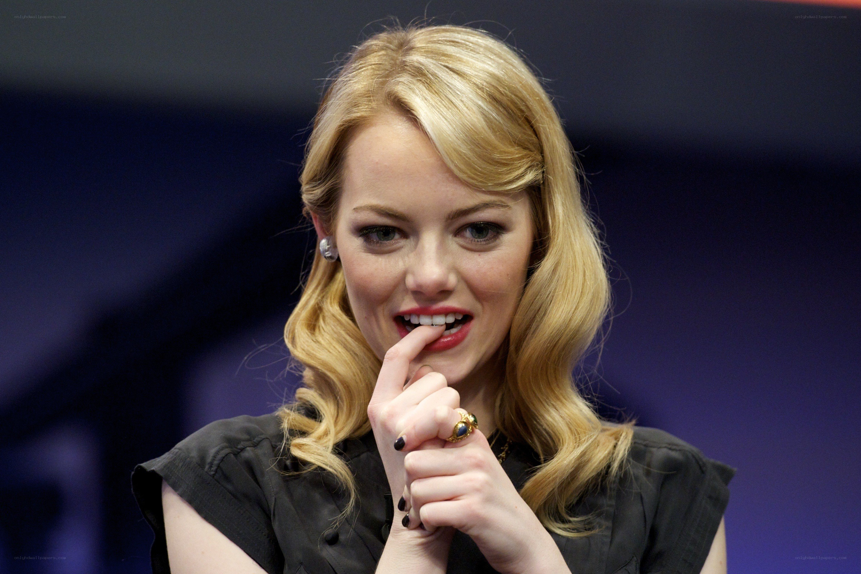 Emma Stone biting finger