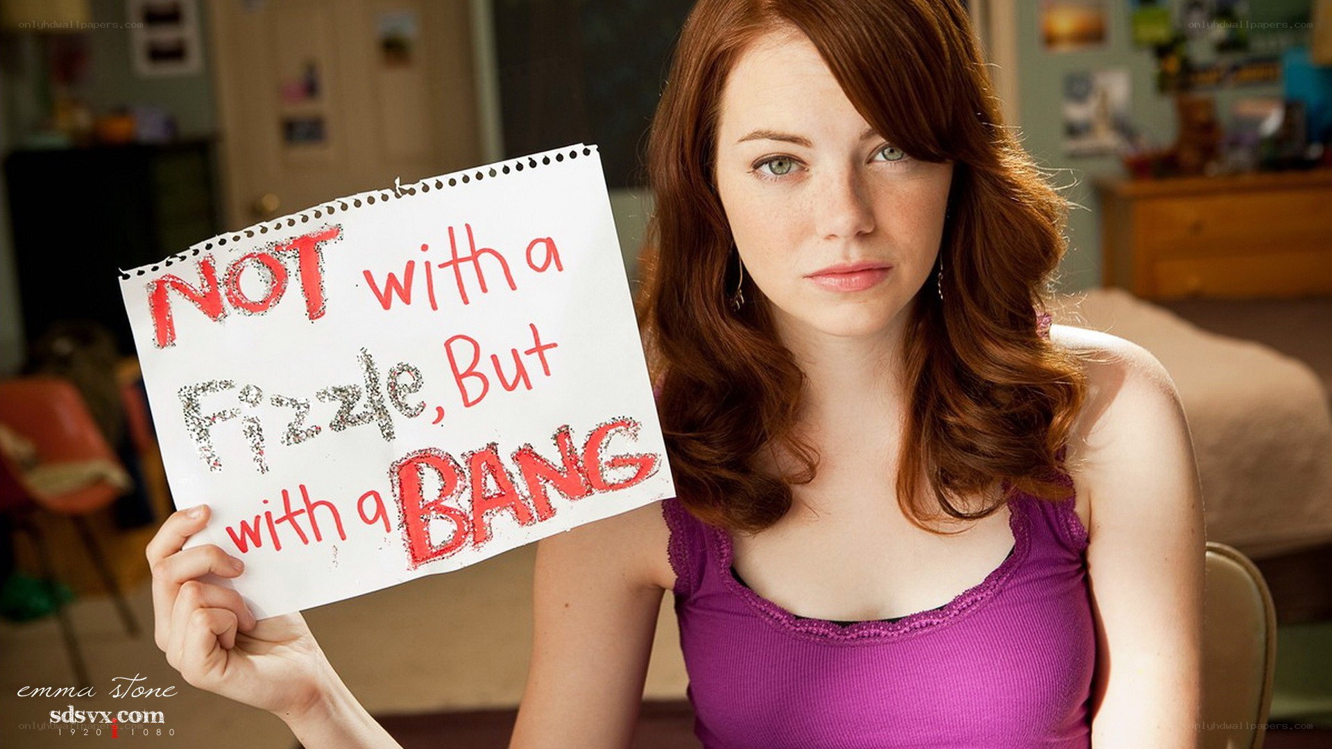 Emma Stone holding sign
