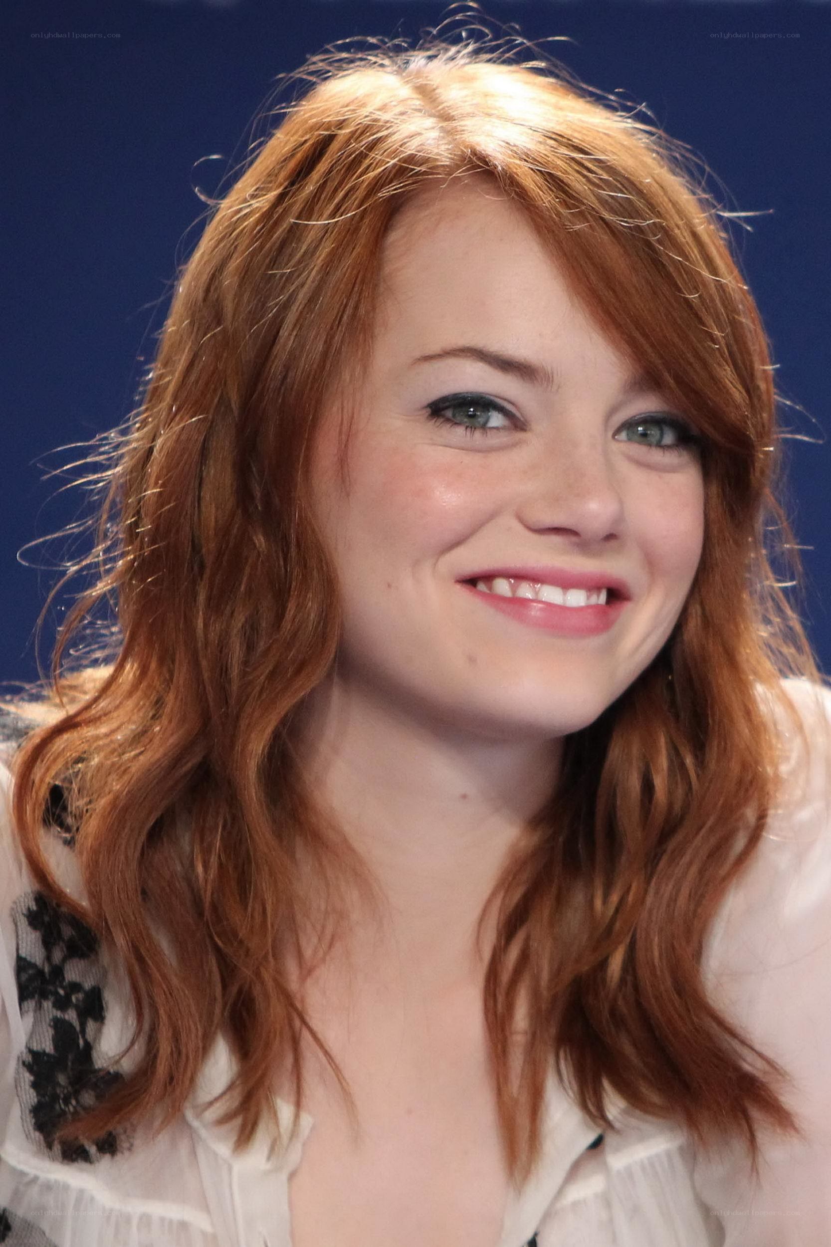 Emma Stone smiling at event