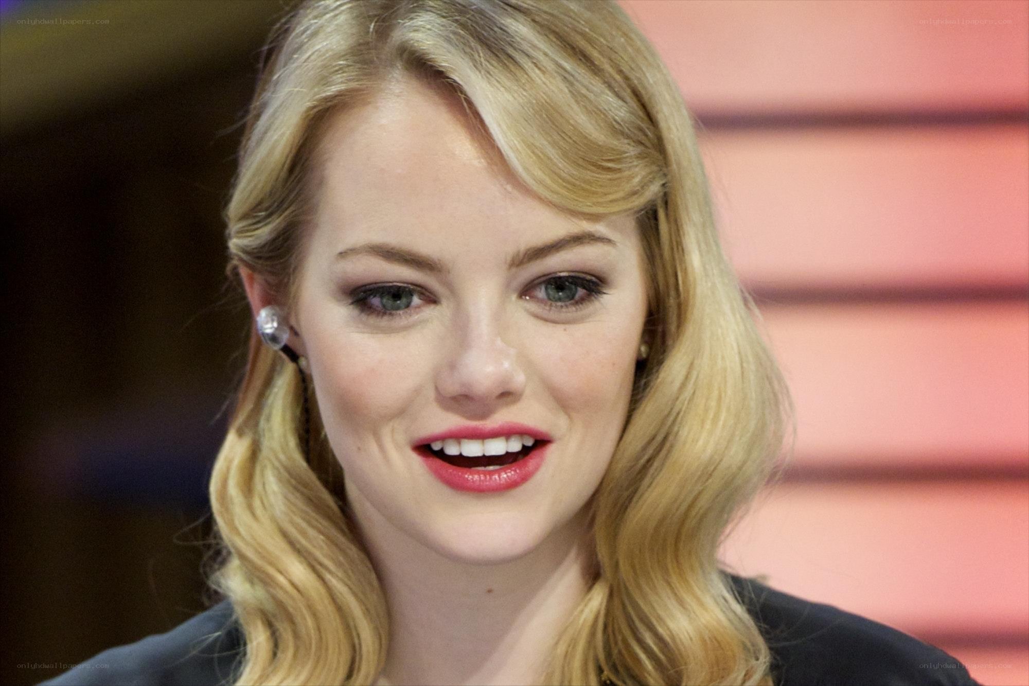 Emma Stone smiling at event