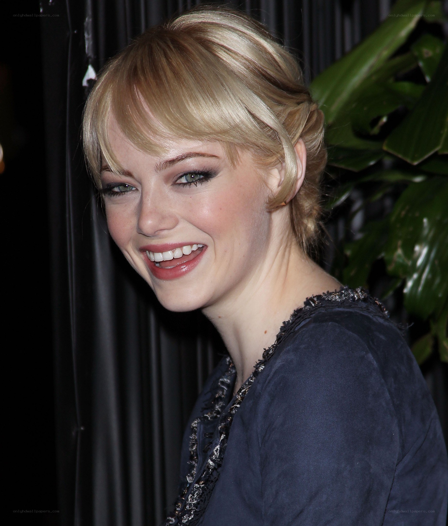 Emma Stone smiling at event