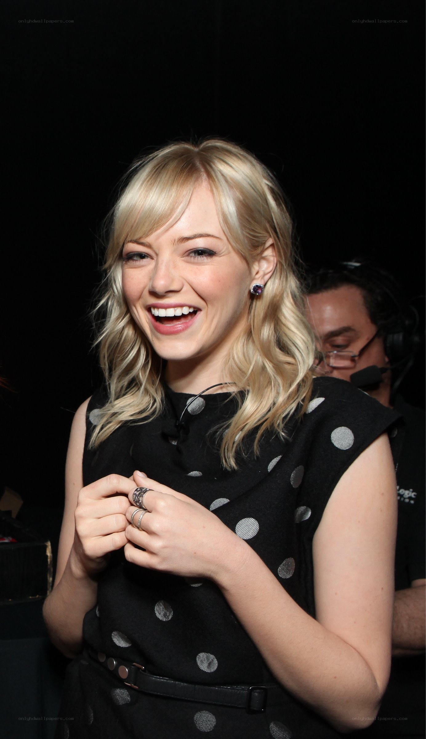 Emma Stone smiling at event